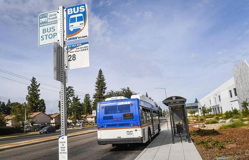 A FAX bus waits at a stop near the Department of Social Services facility in Clovis on Wednesday, Oct. 20, 2021. CRAIG KOHLRUSS CKOHLRUSS@FRESNOBEE.COM