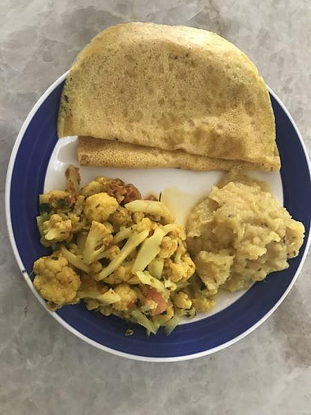 Vijaya Parameswaran’s healthy plate: moong dal dosa, shalgam sabzi on the right, and cauliflower sabzi on the left.