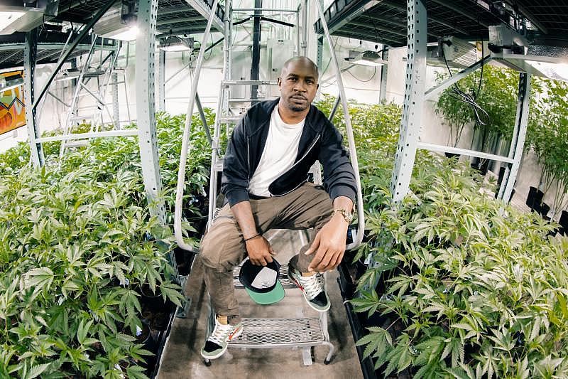 Jesce Horton in a grow room at his Portland-based company LOWD. Photo by Sam Gehrke.