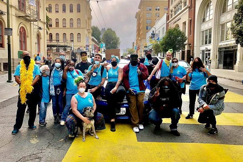 Kristen Marshall and the Dope Project team pose for a portrait during Overdose Awareness Day in 2020. The event gathers providers and community members to hold space for those lost and celebrate people still with them. (Courtesy of Kristen Marshall)