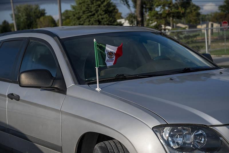 A car sits in the parking lot of the Tyson Foods Storm Lake pork plant. The plant's workforce is made up of many immigrants. Natalie Krebs / IPR