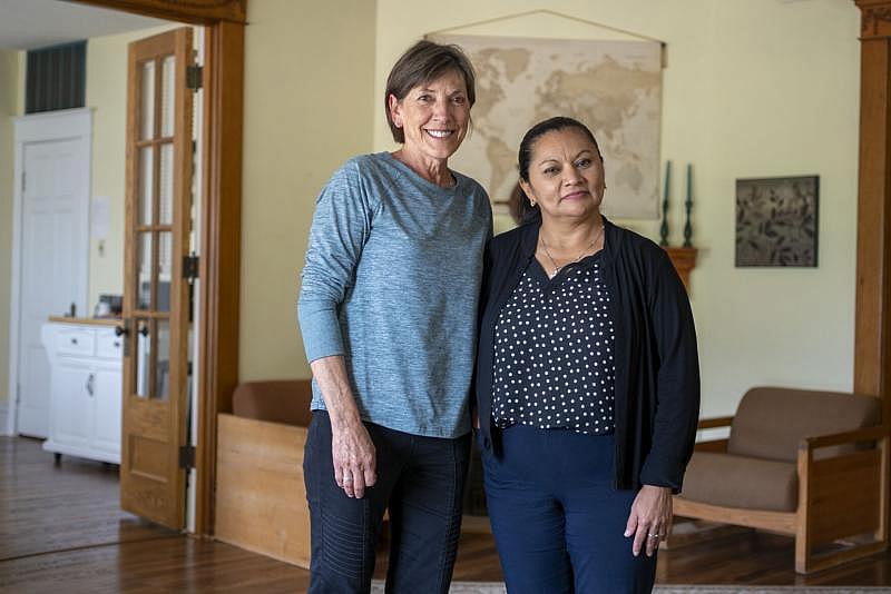 Di Daniels (left) and Emilia Marroquin are members of Salud, a community based health organization. Marroquin, a native of El Salvador, moved to Storm Lake from California in the 1990s. Natalie Krebs / IPR