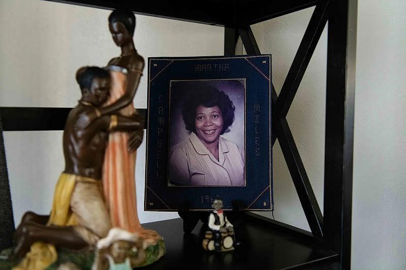A portrait of Martha Miles sits on a bookshelf in her home. She died at 70 on March 30, 2020 after going to Bethany Pointe to recover from a fall. HANNAH GABER, USA TODAY