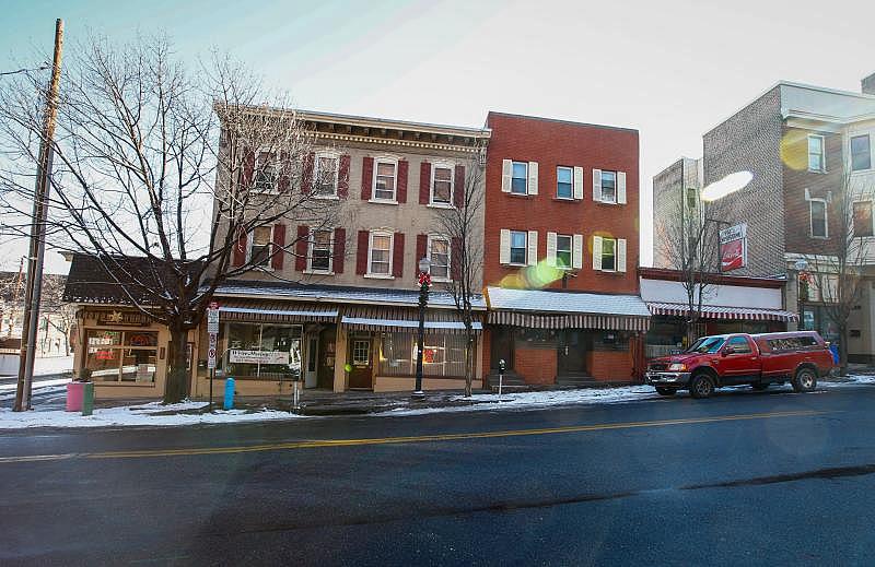 Developer and restaurateur Rafael Palomino plans to demolish this strip of buildings to make way for his nine-story project. The Italianate facade of the middle building will be incorporate into the new design. Saed Hindash | For lehighvalleylive.com