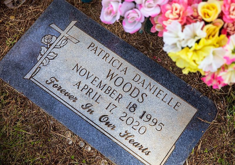 The marker for Patricia Woods, 24, at Cincinnati's Vine Street Hill Cemetery Sept. 30, 2021. She was killed April 17, 2020, in her Westwood apartment while her children, Kayden, then 5, and Kay-Lia, then 14 months, slept. Kayden fled to neighbors for help. Marcus Reed, who Woods was dating, is charged with aggravated murder. LIZ DUFOUR/THE ENQUIRER