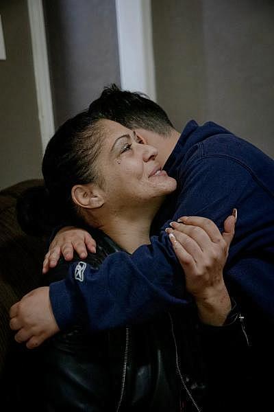“I love you,” Mikey said, hugging his mom, Elizabeth Rodriguez. YEHYUN KIM / CT MIRROR