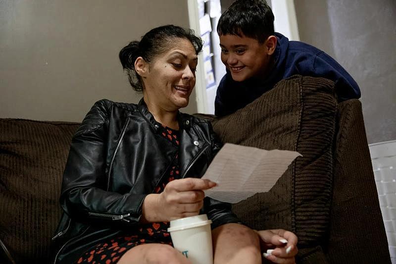 Elizabeth and Mikey Rodriguez go through his Christmas gift wish list. Mikey told Elizabeth that she doesn't have to get him the Oculus glasses because they would need that money to get a place, she said. YEHYUN KIM / CT MIRROR Elizabeth and Mikey Rodriguez go through his Christmas gift wish list. Mikey told Elizabeth that she doesn't have to get him the Oculus glasses because they would need that money to get a place, she said. YEHYUN KIM / CT MIRROR