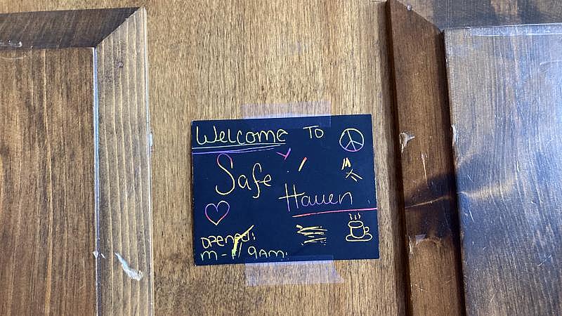 A sign taped to the door of Safe Haven, a drop-in center for homeless people in Woonsocket, RI LYNN ARDITI/THE PUBLIC'S RADIO A sign taped to the door of Safe Haven, a drop-in center for homeless people in Woonsocket, RI LYNN ARDITI/THE PUBLIC'S RADIO
