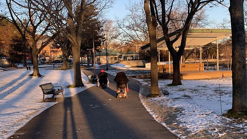 A couple who live in a senior high-rise on a morning walk in WWII Memorial Park in Woonsocket, RI. LYNN ARDITI/THE PUBLIC'S RADIO