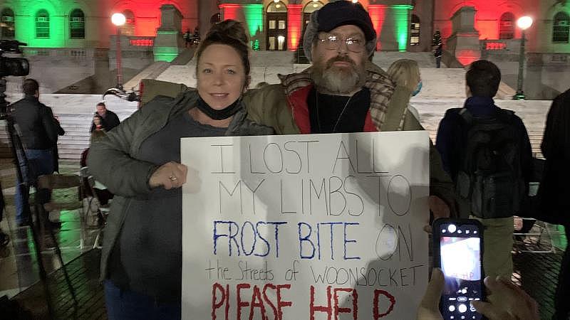 A formerly homeless man, Bill, with Amanda Leigh, then of Thundermist Health Center, at a State House protest in 2021. COURTESY OF TAMMY ZERRENNER