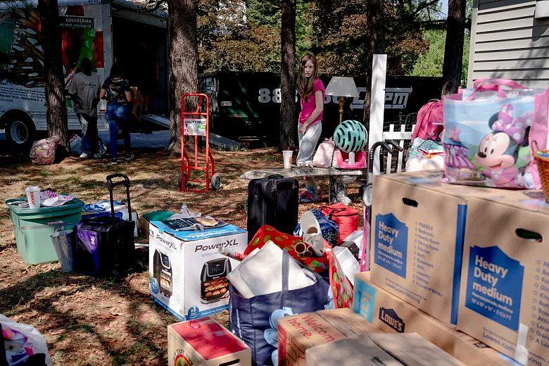 Loryann Pisani, 16, looks at her family's belongings to be moved at her place in Bloomfield, where she lived her whole life. Her family had to suddenly move to West Hartford after they were evicted. YEHYUN KIM / CTMIRROR.ORG