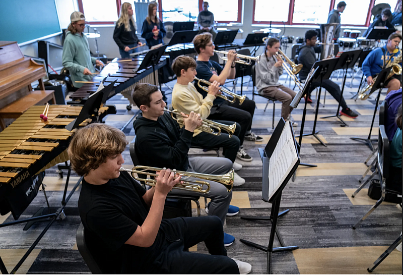 Bennett Solomond plays trumpet with his North Allegheny Intermediate High School classmates during band on Nov. 2, 2022. Bennett, now, 15, was secluded in elementary school and middle school while in Michigan. For better services, his family moved to western Pennsylvania, where his parents say Bennett is thriving in school.