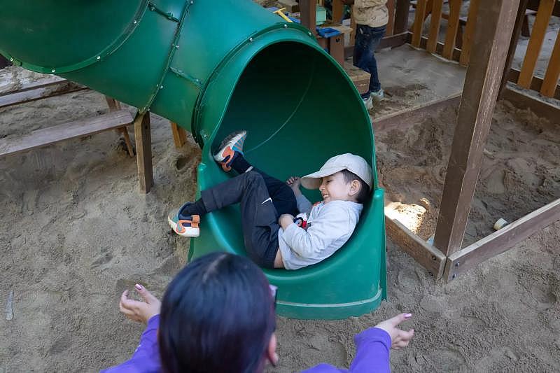 Isabel Daniels (bottom) runs through activities with children at Baby Steps on Friday, Nov. 18, 2022, in San Francisco.(Paul Kuroda / For The San Diego Union-Tribune)