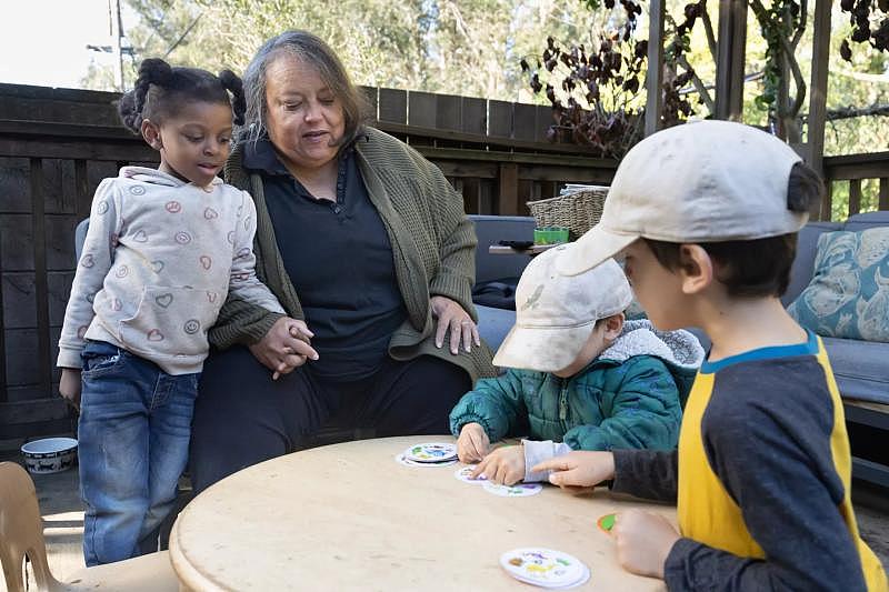 Owner Pat Sullivan (middle) supervises a card game with children at Baby Steps on Friday, Nov. 18, 2022, in San Francisco.(Paul Kuroda / For The San Diego Union-Tribune) Owner Pat Sullivan (middle) supervises a card game with children at Baby Steps on Friday, Nov. 18, 2022, in San Francisco.(Paul Kuroda / For The San Diego Union-Tribune)