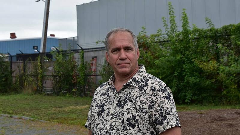 Chris Marchi stands where the homes of Neptune Road once stood at the entrance to Wood Island Park Chris Marchi stands where the homes of Neptune Road once stood at the entrance to Wood Island Park