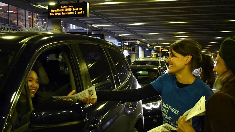 Sonja Tengblad hands an information sheet to a driver idling outside of Logan Airport's Terminal B Sonja Tengblad hands an information sheet to a driver idling outside of Logan Airport's Terminal B