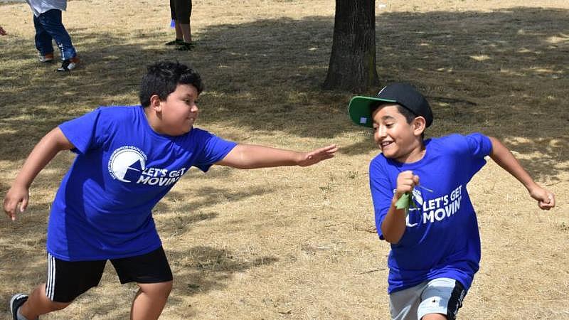 Kids play at East Boston's Memorial Park as part of the health program Let's Go Movin'. Kids play at East Boston's Memorial Park as part of the health program Let's Go Movin'.
