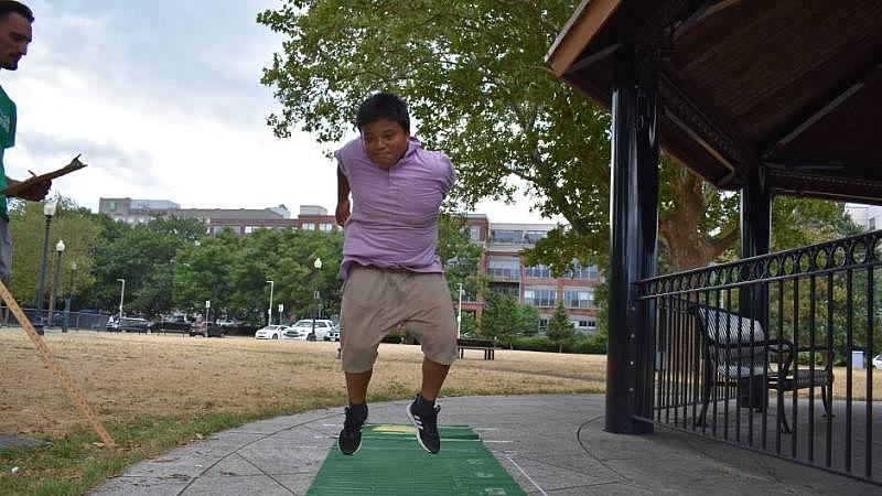 Let's Go Movin' coordinators test the physical fitness of program participants at East Boston's Memorial Park. 