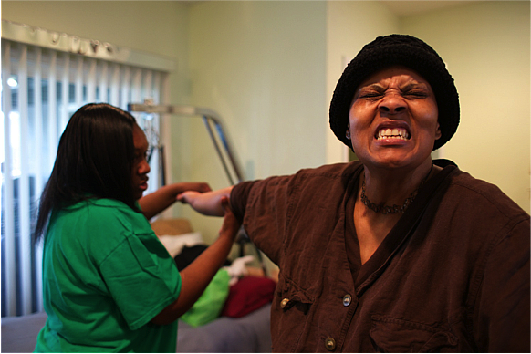 Loretta Jackson provides daily physical therapy for her sister, Shirlene English, who had a stroke. Capital Public Radio | Andrew Nixon Loretta Jackson provides daily physical therapy for her sister, Shirlene English, who had a stroke. Capital Public Radio | Andrew Nixon