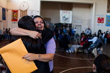 Jenny Bird, 26, hugs a friend after her graduation from NARAs residential treatment program.