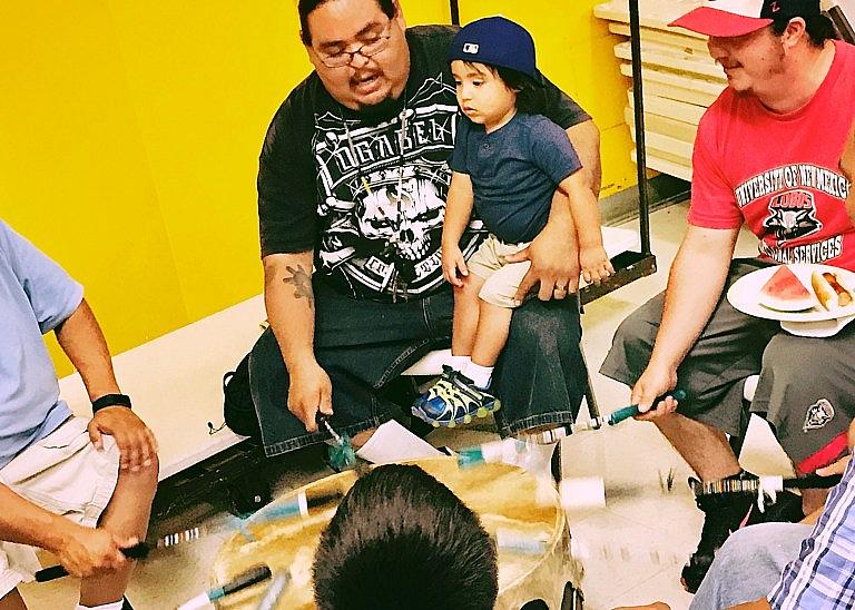 Tso Yanez and his son drum and sing at United American Indian Involvement in Los Angeles, California. Yanez says reconnecting to Native culture has helped him with sobriety. (Photo-Antonia Gonzales) Tso Yanez and his son drum and sing at United American Indian Involvement in Los Angeles, California. Yanez says reconnecting to Native culture has helped him with sobriety. (Photo-Antonia Gonzales)
