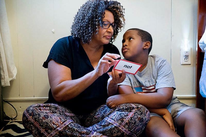 Avril Absolum and son Jalen are very close. He looks to her for guidance as they work their way through flash cards.