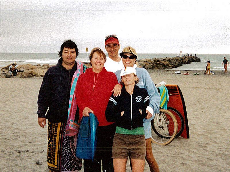 Jason Nishimoto (left) on the beach with family and friends. (Courtesy the Nishimoto family)