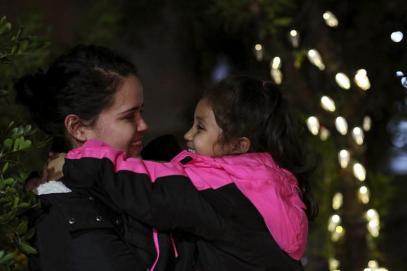 Odette Gutierrez holds her daughter, Angelica Valerio, 5. Gutierrez did not receive any prenatal care while pregnant in high school because she concealed her pregnancy from her mother.