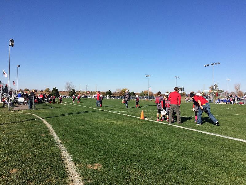 The youth football complex at Heritage Park in Olathe, Kansas, draws hundreds of players and family members to weekly games. CREDIT ALEX SMITH / HEARTLAND HEALTH MONITOR