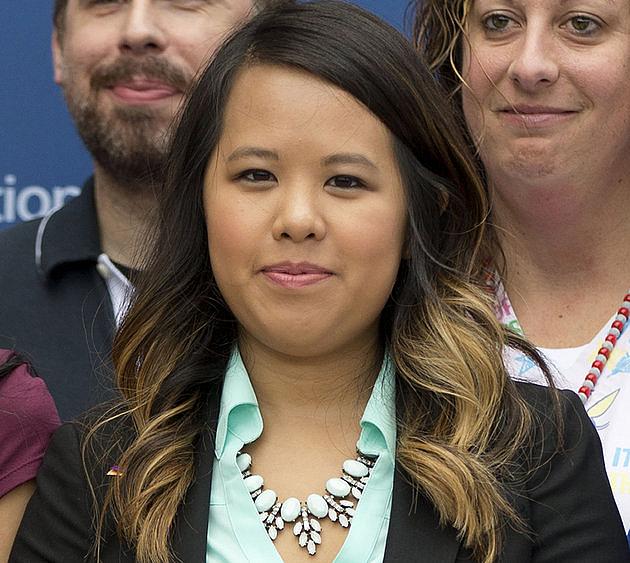 In this Oct. 24, 2014 file photo, nurse Nina Pham poses for a photo at the National Institutes of Health in Bethesda, Maryland. (AP Photo/Pablo Martinez Monsivais)