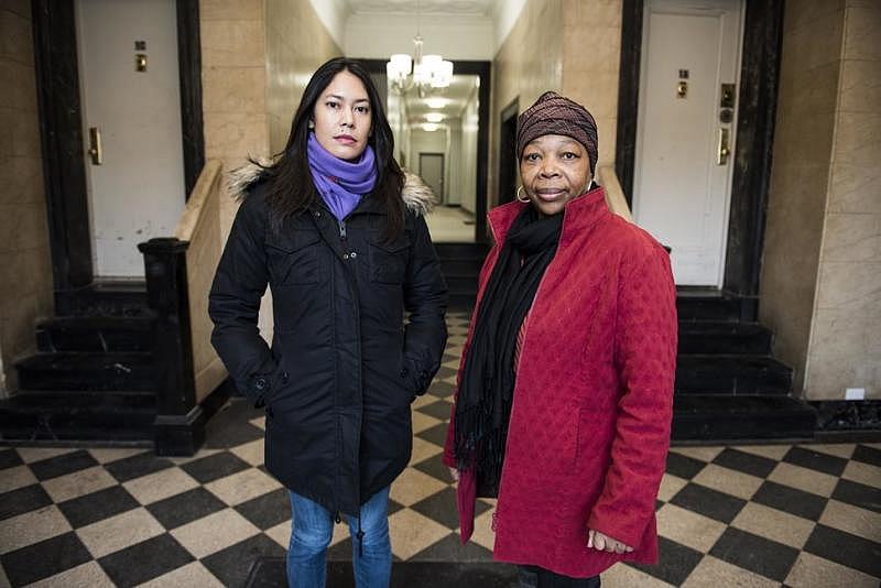 Dara Soukamneuth and Clentine Fenner inside the lobby of their apartment building in Crown Heights, Brooklyn, on Jan. 13, 2018. The two women are members of the building’s tenant union, which advocates for safe and healthy living conditions.