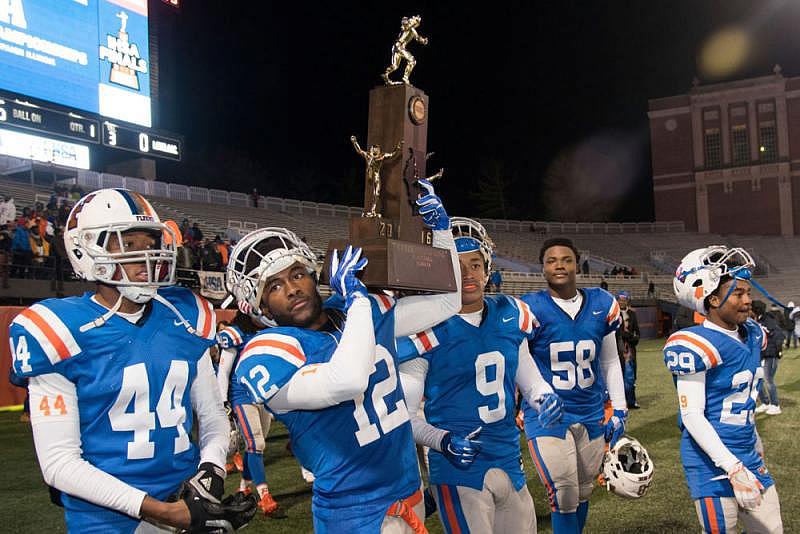 East St. Louis High School won Illinois’ Class 7A high school football championship in 2016. Locals hope the city will be able to match its academic prowess with its legacy of athletic glory. Photo: AP Photo/Bradley Leeb