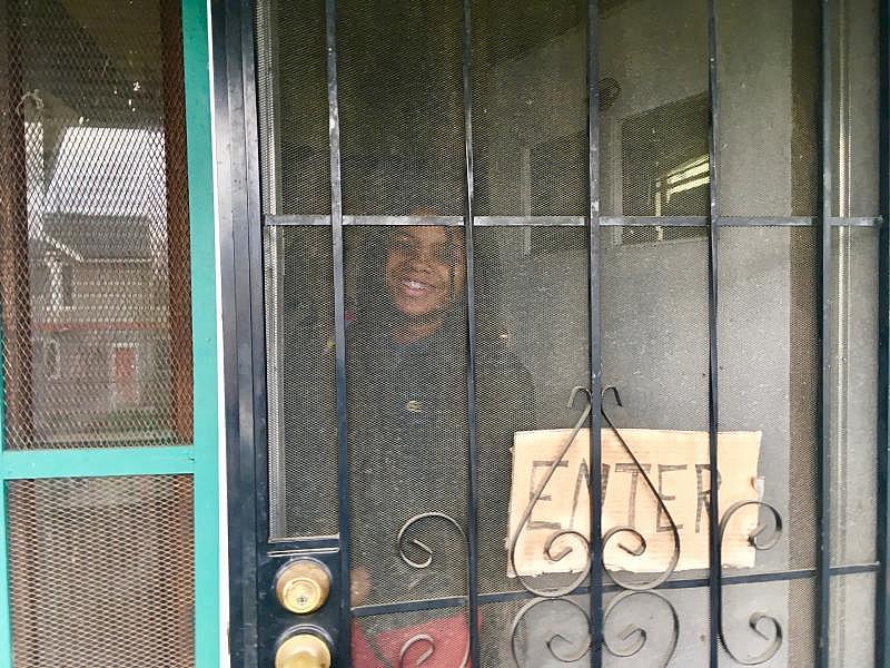 Destiny Shabazz, 17, at the West Oakland home where she rents a small room for $300 a month. (Lee Romney/KALW)
