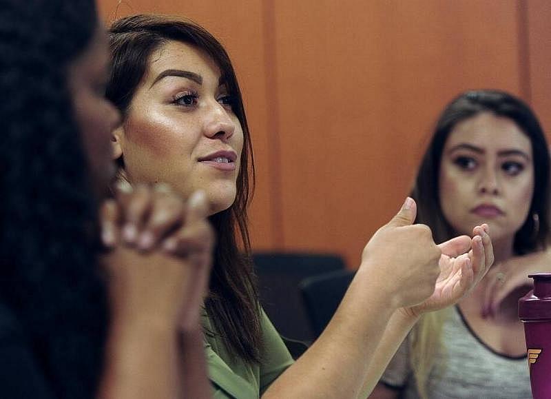 Alejandra Saldivar from Barrios Unidos asks a question during the Fresno County Preterm Birth Initiative’s health and education meeting Tuesday, Sept. 12, 2017 in Fresno.