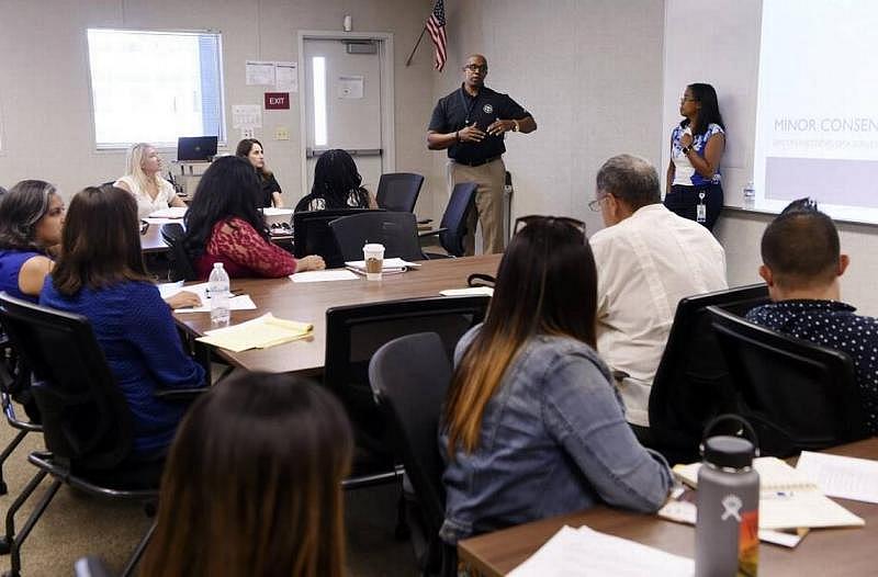 Jeff Hunt, top left, and Alma McKenry, top right, lead the discussion during Fresno County Preterm Birth Initiative's health and education meeting Tuesday, Sept. 12, 2017 in Fresno, CA.