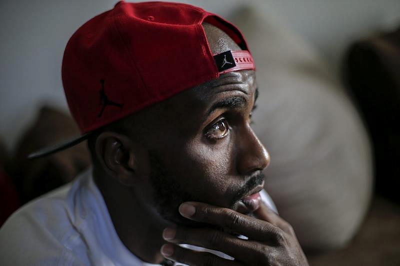 Chris Robinson, 32, a former star wide receiver on the Panthers youth football team, currently works as a hotel bellman with hopes of starting a mentoring program for troubled youth. Robinson's cousin, Drontreal Beal, also a former member of the Panthers, was shot to death in 2016. Chris Robinson, 32, a former star wide receiver on the Panthers youth football team, currently works as a hotel bellman with hopes of starting a mentoring program for troubled youth. Robinson's cousin, Drontreal Beal, also a former member of the Panthers, was shot to death in 2016.