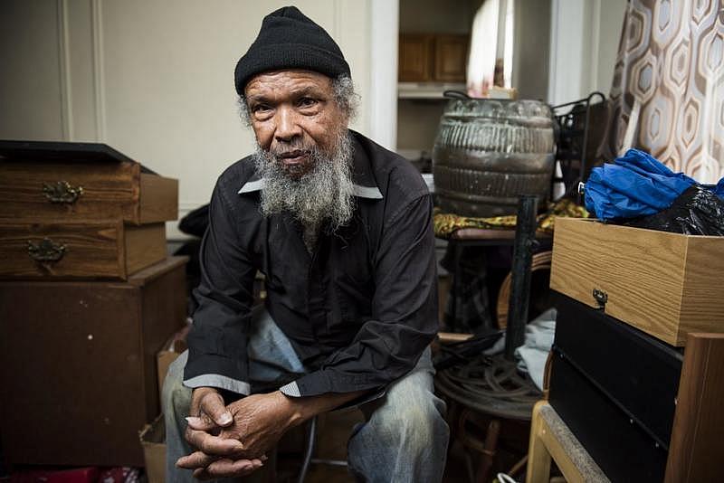Brooklyn resident Winston Stiell sits among his possessions on Jan. 8, 2018. Stiell and his wife Violet were evicted from their Prospect Lefferts Gardens apartment last year.