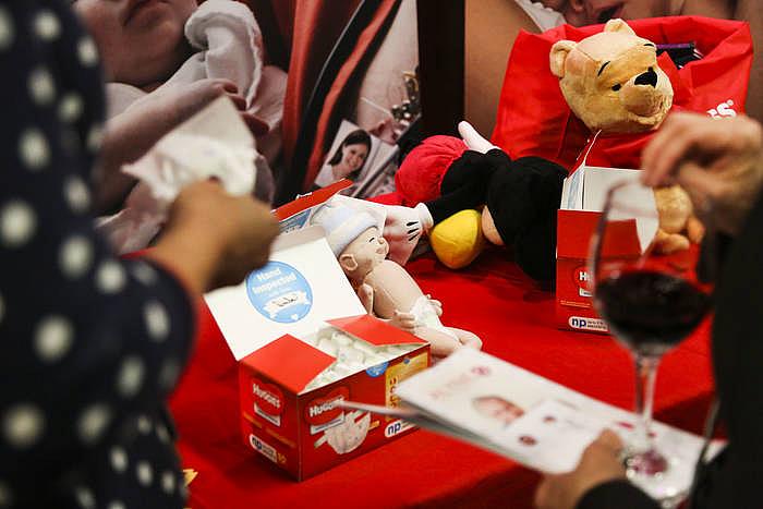 At the conference, Huggies shows off its latest product: diapers for “micro-preemies” weighing two pounds or less.
