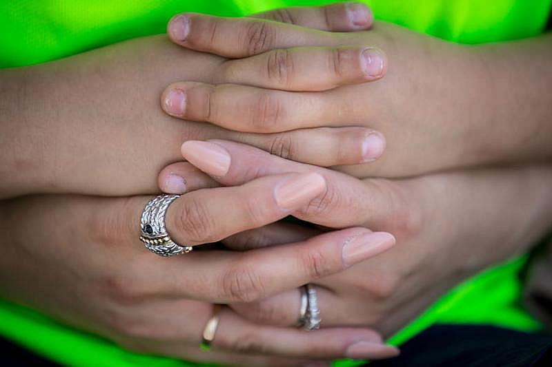 Cristine Pagan holds hands with her son Dean. She worries for his future. “I see it as sort of a time bomb,” Cristine Pagan said. “What kind of aftermath will there be?”