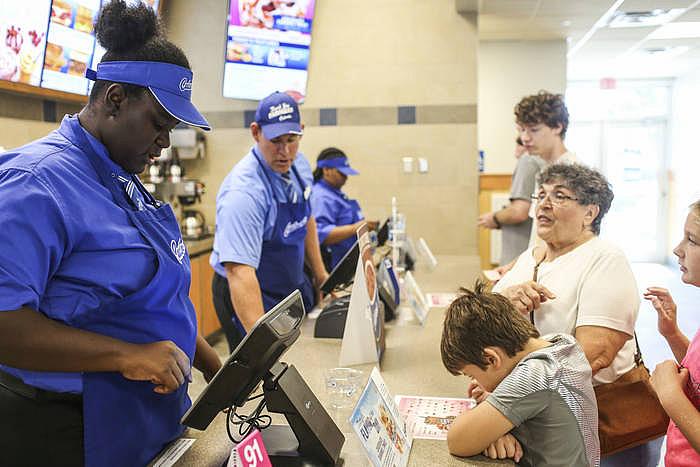 Lalandria rings up an order as a cashier at Culver’s in Pinellas Park.