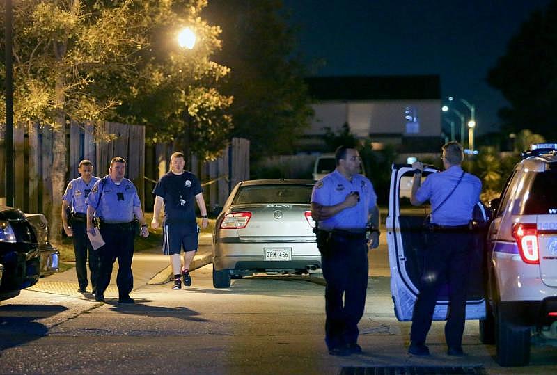 NOPD investigates the scene of the shooting involving Malachi Hill's family on Wednesday, October 12, 2016.