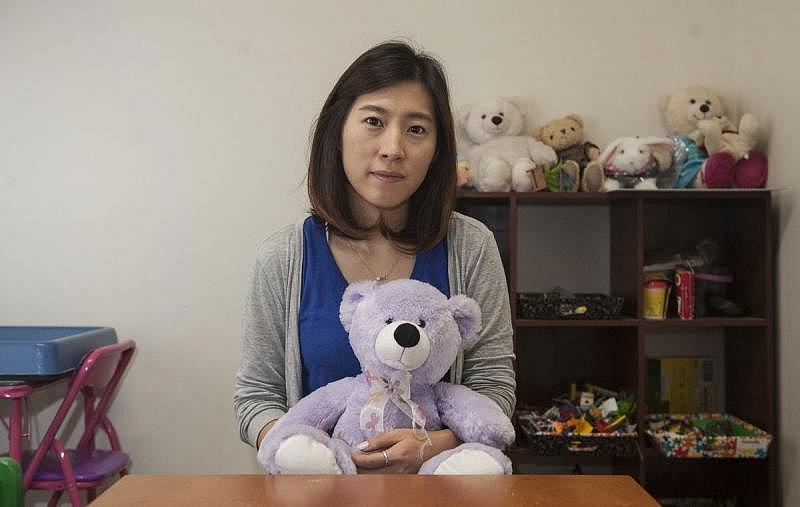 Jeehye Kim counsels children in this therapy room at the Korean Community Services in Buena Park. 