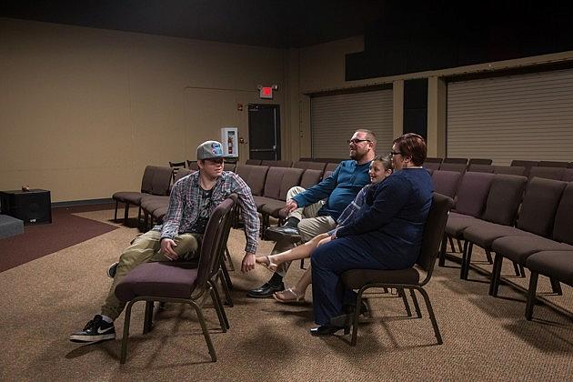 Brent and Jennifer Agnew with their children Caleb, now 16, and Olivia, 9, at the Lakewood Baptist Church in Gainesville, Georgia (Jesse Pratt Lopez)   