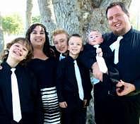 The Robison family poses for photos in August shortly after Gabe returned home from Texas. Gabe, then 14, is on the far left next to his mother, Jaleadeanne Robison.