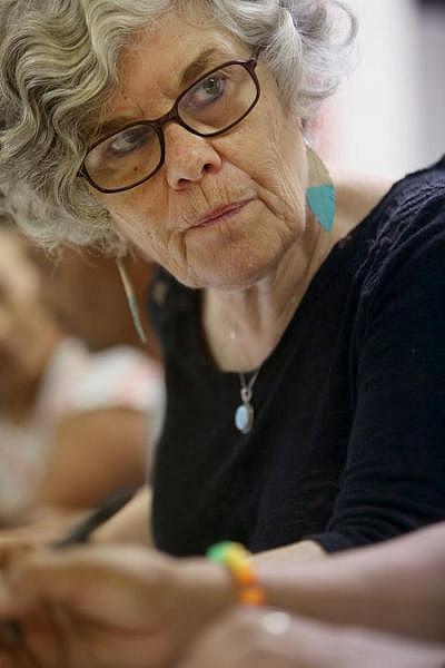 Laurie Melrood, coordinator of the Southern Arizona Transnational Task Force and a family services consultant, helps people fill out guardianship paperwork in case of deportation during a workshop at the Mexican Consulate of Tucson, 3915 East Broadway Blvd, on August 05, 2017. 