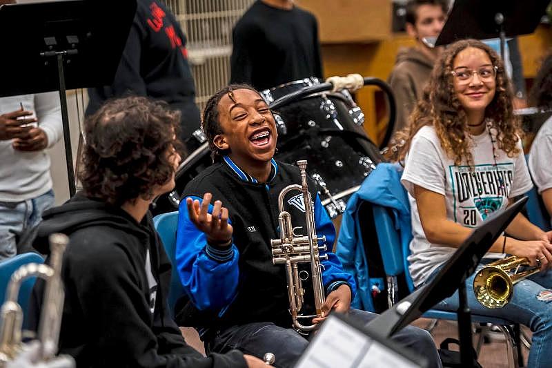 Ethan Zawacki of Chalfant, left, Jaden Weems of Rankin, center, and Sierra Smith of Swissvale, right, joke around before the start of band class at Woodland Hills Junior/Senior High School in Churchill.