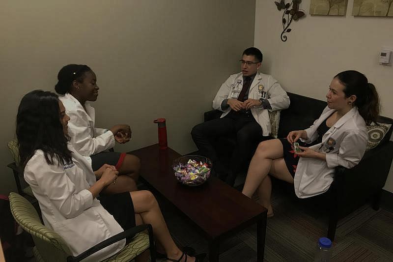 UCR medical students Jericha Viduya, Kleshie Baisie, Antonio Garcia, and Monica Gutierrez take a break from studying.