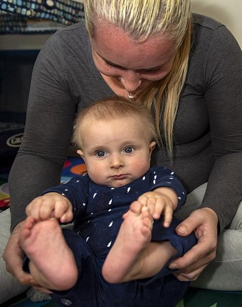 Leah Renee Tonelli plays with her 7-month-old son Noah at the MFI Recovery Center in Pasadena where they are both staying. (Photo by Mindy Schauer, Orange County Register/SCNG)