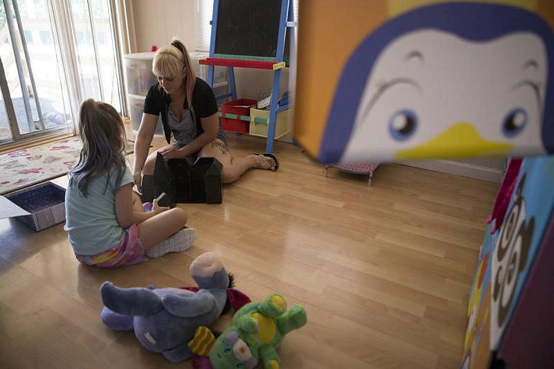Sabrina and Aroara in their two-bedroom home in Paradise, California. (Anne Wernikoff/KQED)