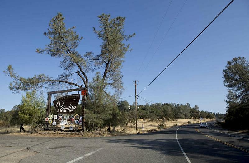 A sign welcoming people to Paradise on State Route 191 on Aug. 13, 2018. (Anne Wernikoff/KQED)